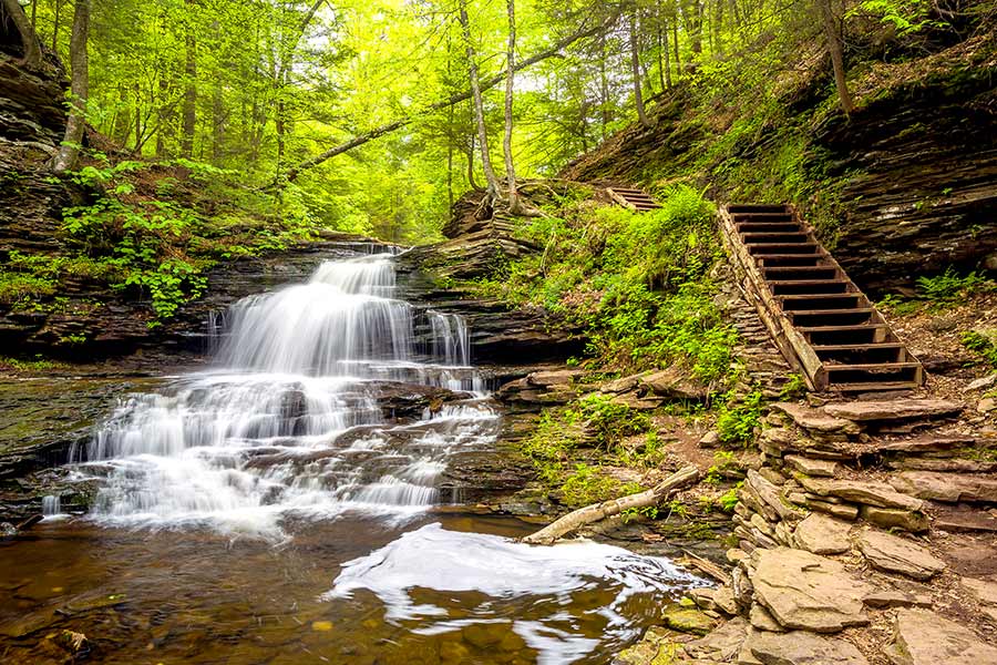 Wooden staircase beside Onondaga Waterfall located in Ricketts Glen State Park