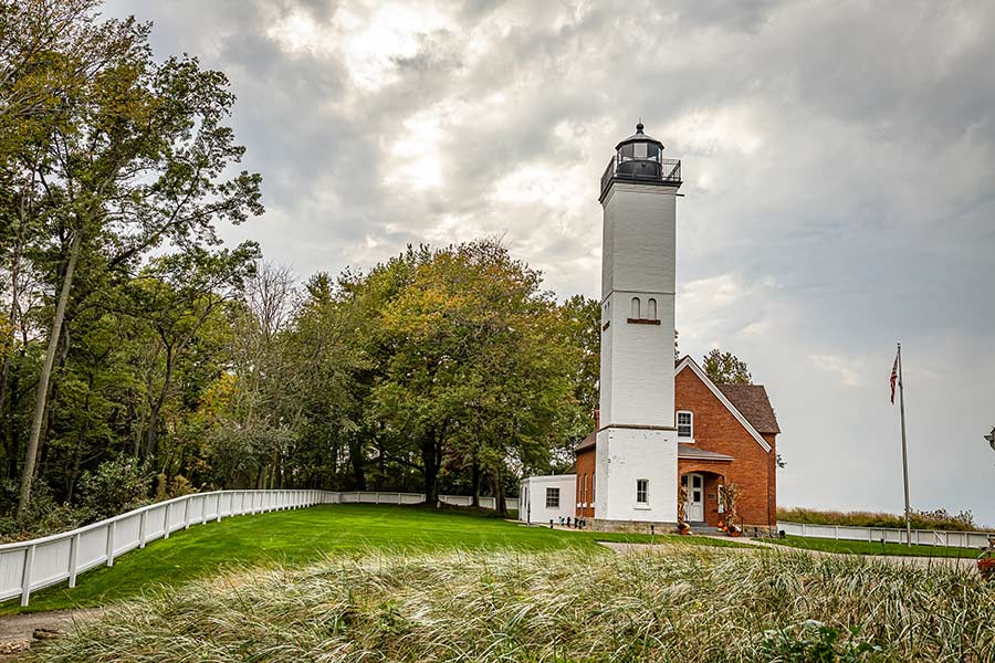 White lighthouse and red lightkeepers house at Presque Isle, Erie Pennsylvania most visited park